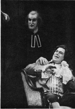 Phillip Skinnger (Basillio) plotting with Richard Johnson (Bartolo). Photo by Patrick L. Pfister