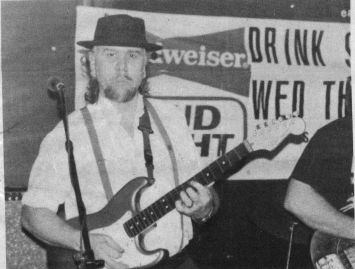 SOMETHING WRONG, CURTIS? Probably not, since he was a big hit at his album release party at the Cherokee Blues Club on July 11. The album is titled Something's Wrong and is available at ear X-tacy and at Curtis' performances. Photo by Jean Metcalfe