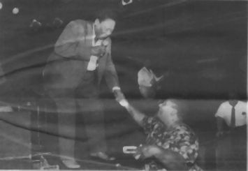 Blues Singer Bobby 'Blue Bland' receives a handshake from a fan at Coyote's on June 28. Photo by Eddie Davis