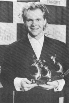 Steven Curtis Chapman holds the three Dove Awards he won at the Gopsel Music Association's 25th Annaul Dove Awards, bringing his total to 21 Dove Awards. Photo by John Lee Mongomery III