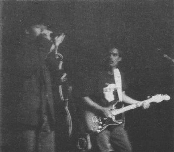 Rude Mood, winners of the KBS 2nd Annual Amateur Blues Competition. Above, Phil Smith, vocals/hardp and Rex Cushman, guitar