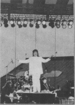 Kuttke Rucard atop his piano at the fair. Photo by Wally Stewart